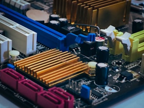 Close-up of a computer motherboard with colorful components.