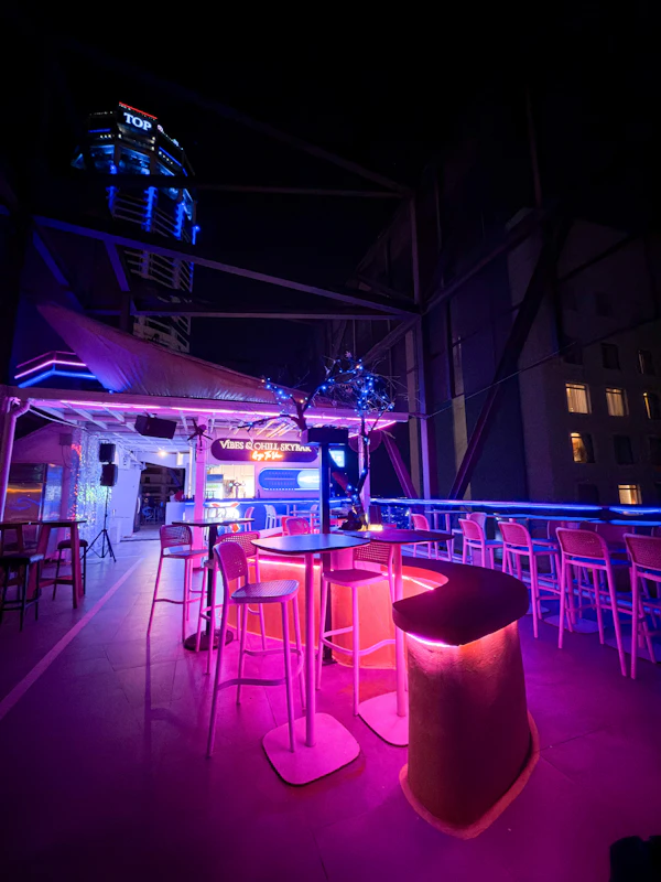 Rooftop bar lit at night