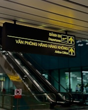 Airport signs for departures and airline office