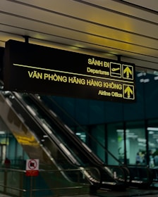 Airport signs for departures and airline office