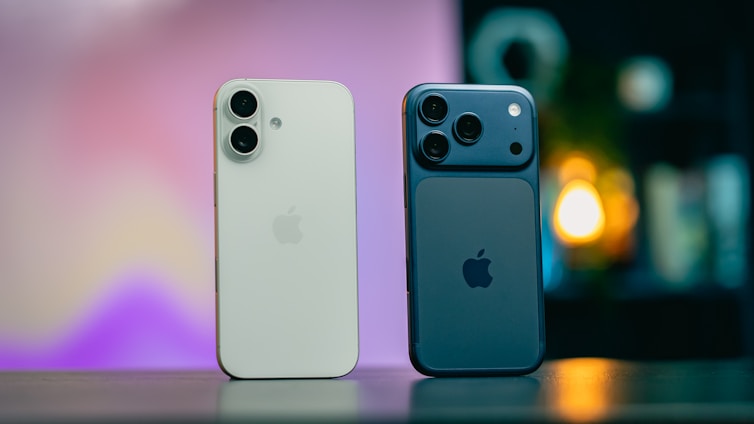 Two iphones, white and blue, side by side.