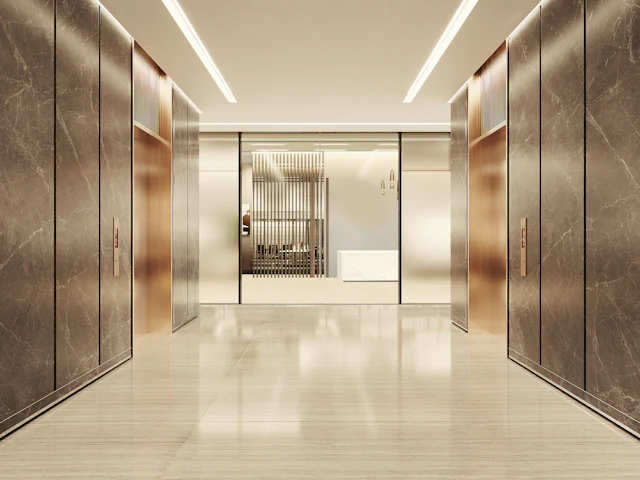 Metal Clad Lift Lobby — commercial reception interior design