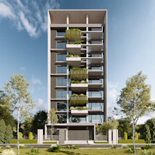 Modern apartment building with balconies and greenery.