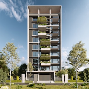 Modern apartment building with balconies and greenery.