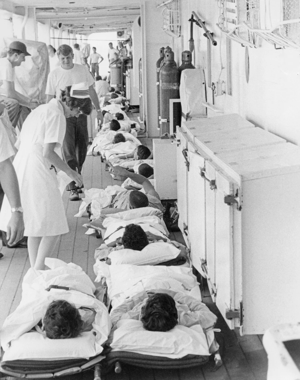 Nurses attending to patients in a calm clinical setting
