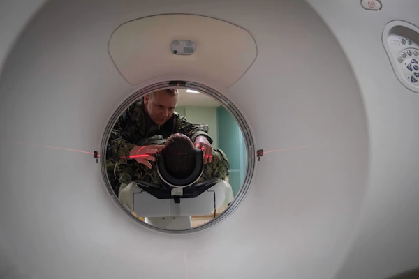 Radiographer positioning a patient