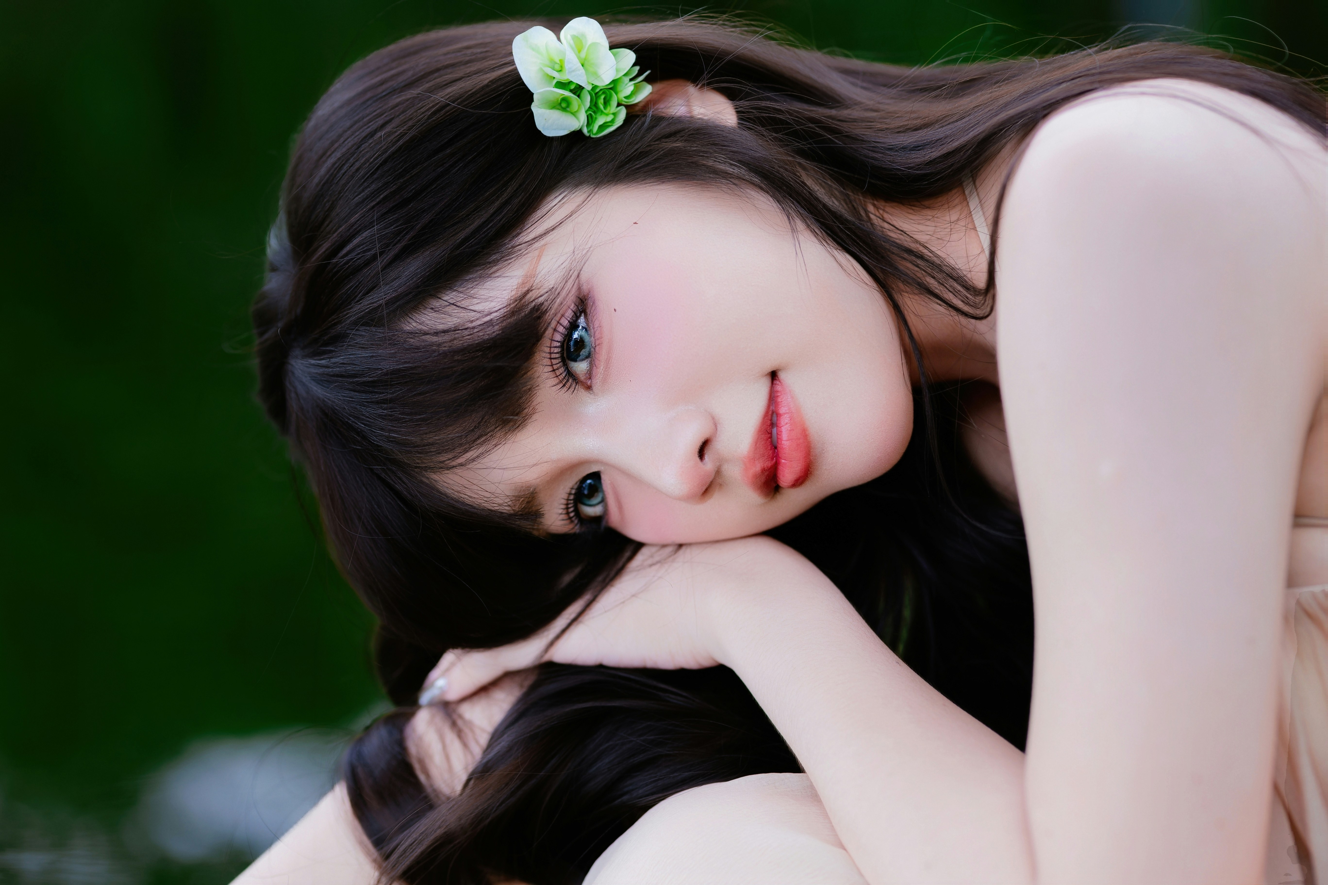 Young woman with a flower in her hair
