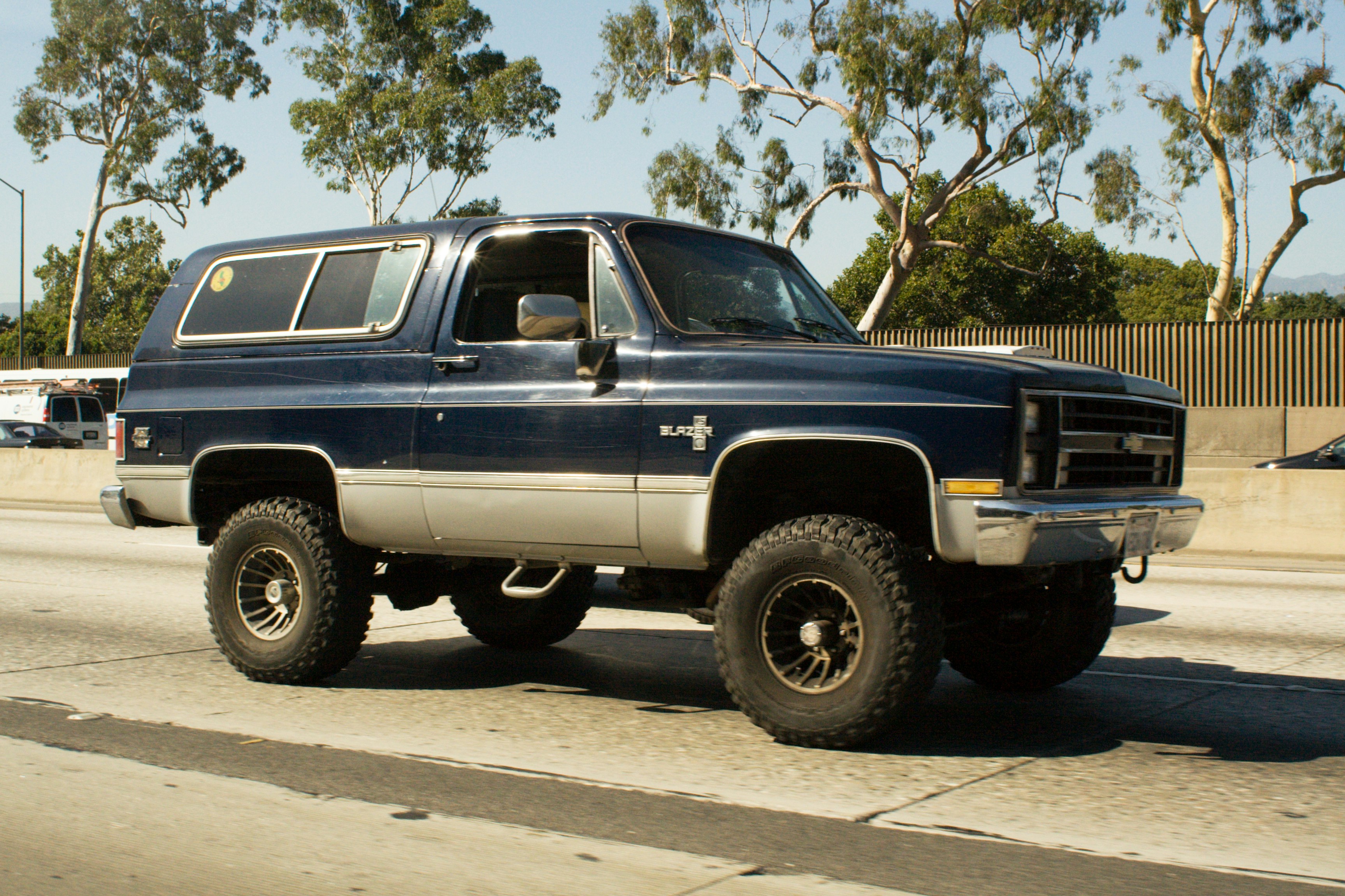 Dark blue vintage suv driving on a highway photo – Free Travel Image on  Unsplash, image size:3000x2000