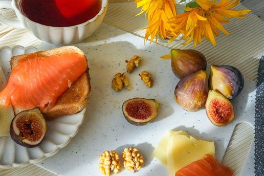 Smoked salmon toast with figs, cheese, and walnuts.