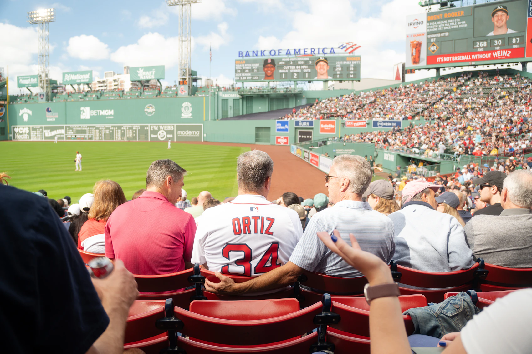Spectators watching a baseball game inside Fenway Park in Boston