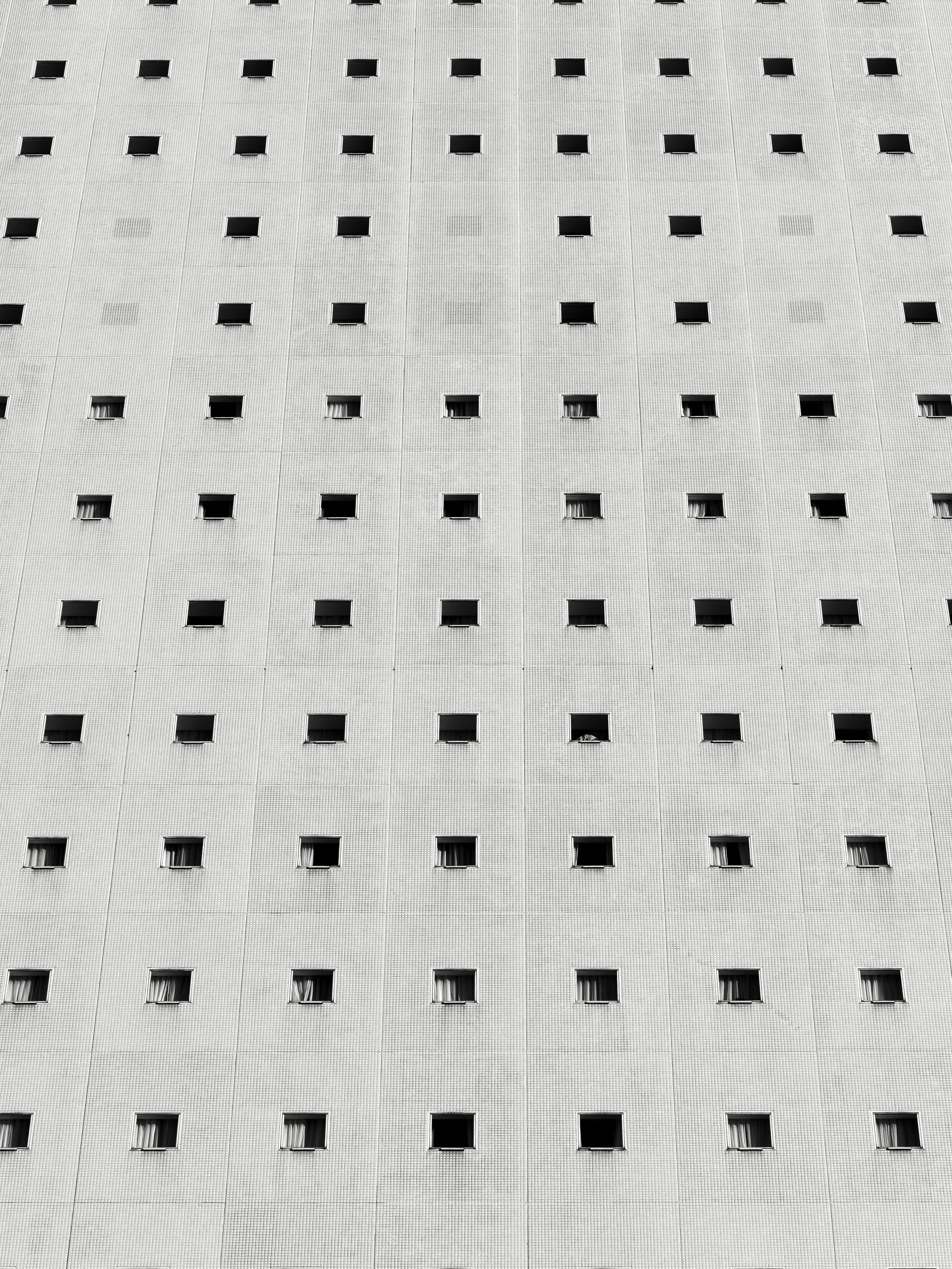 Grid of small windows on a concrete building