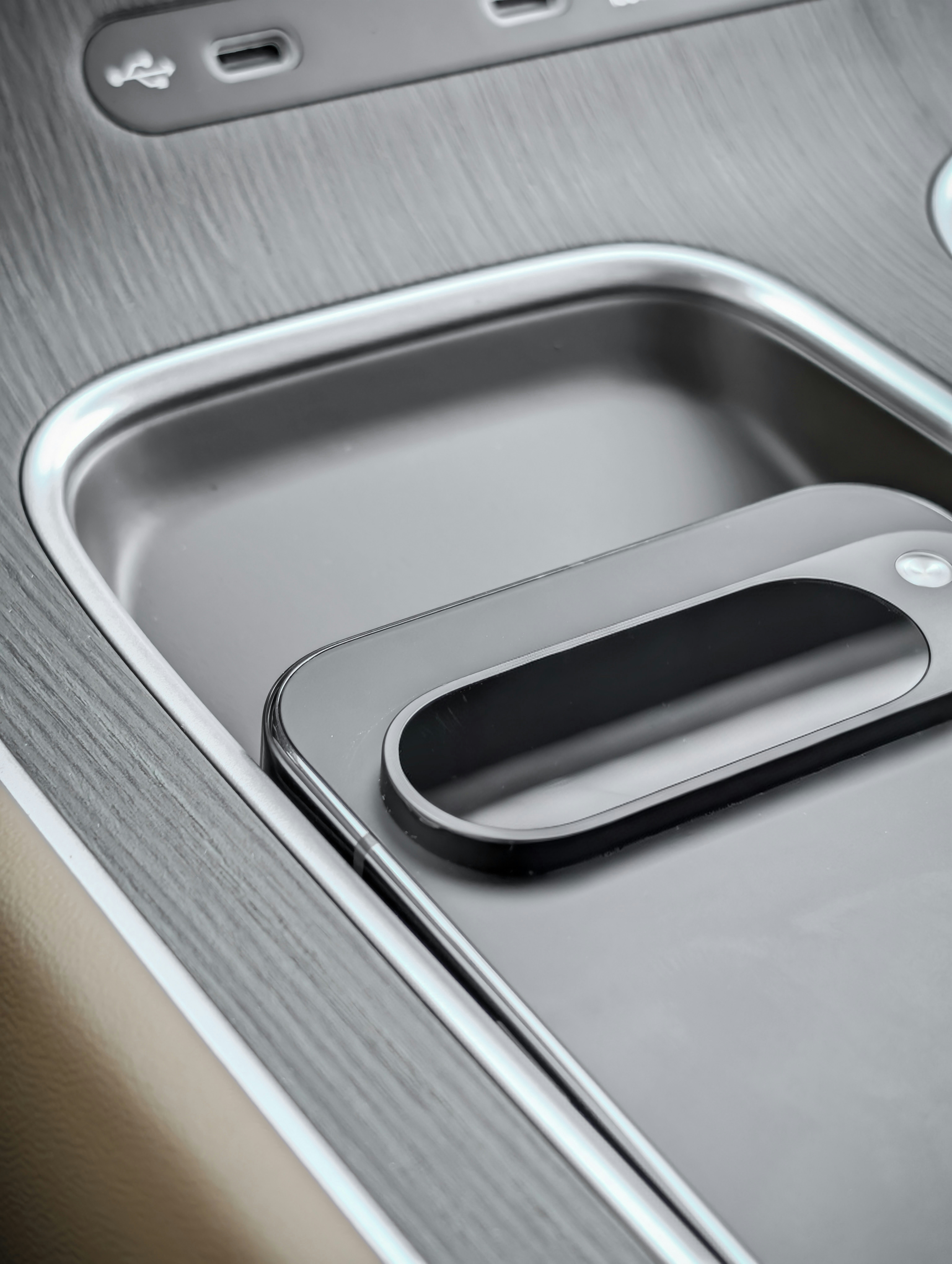 Modern car interior with charging ports and tray