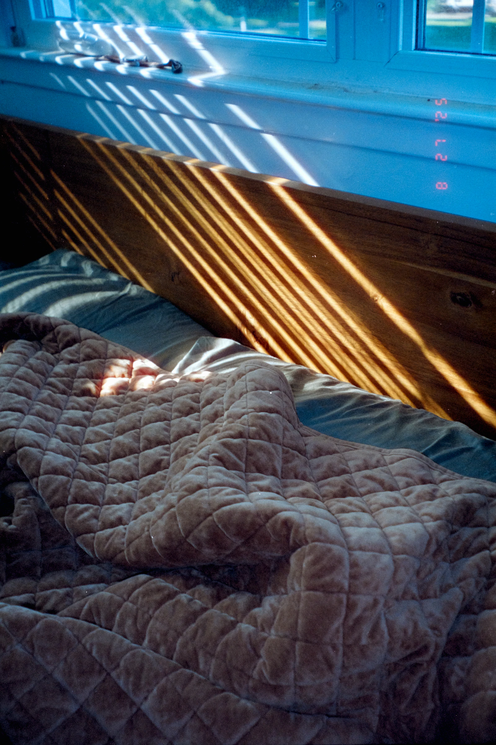 Private resident bedroom with hotel-quality linens and natural light
