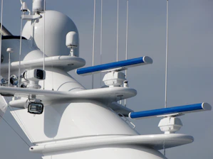White ship with radar antennas and navigation equipment