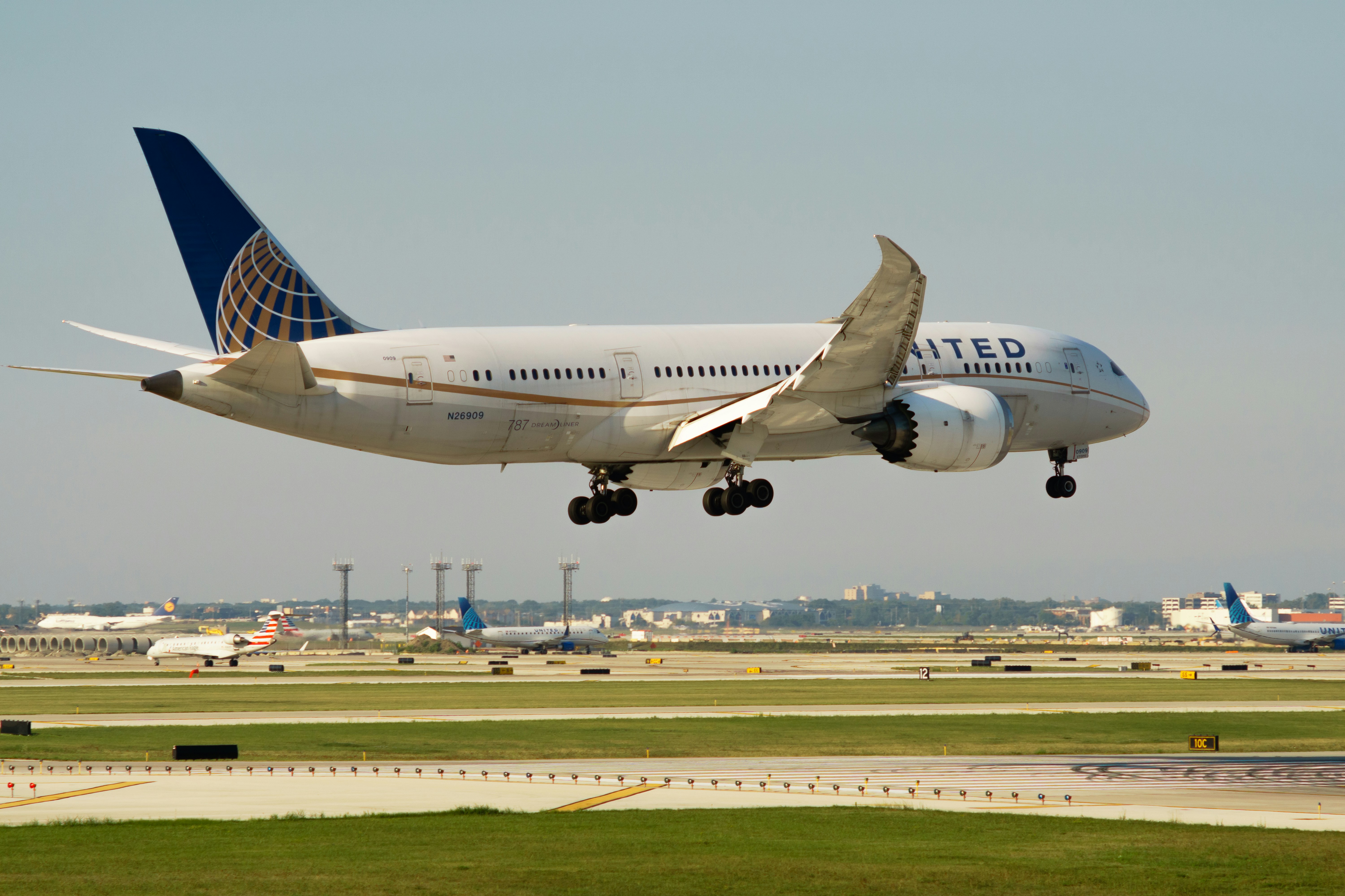 United airlines plane landing on runway