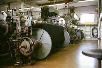 Row of industrial looms in a workshop