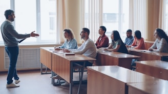 Teacher lecturing students in a classroom setting