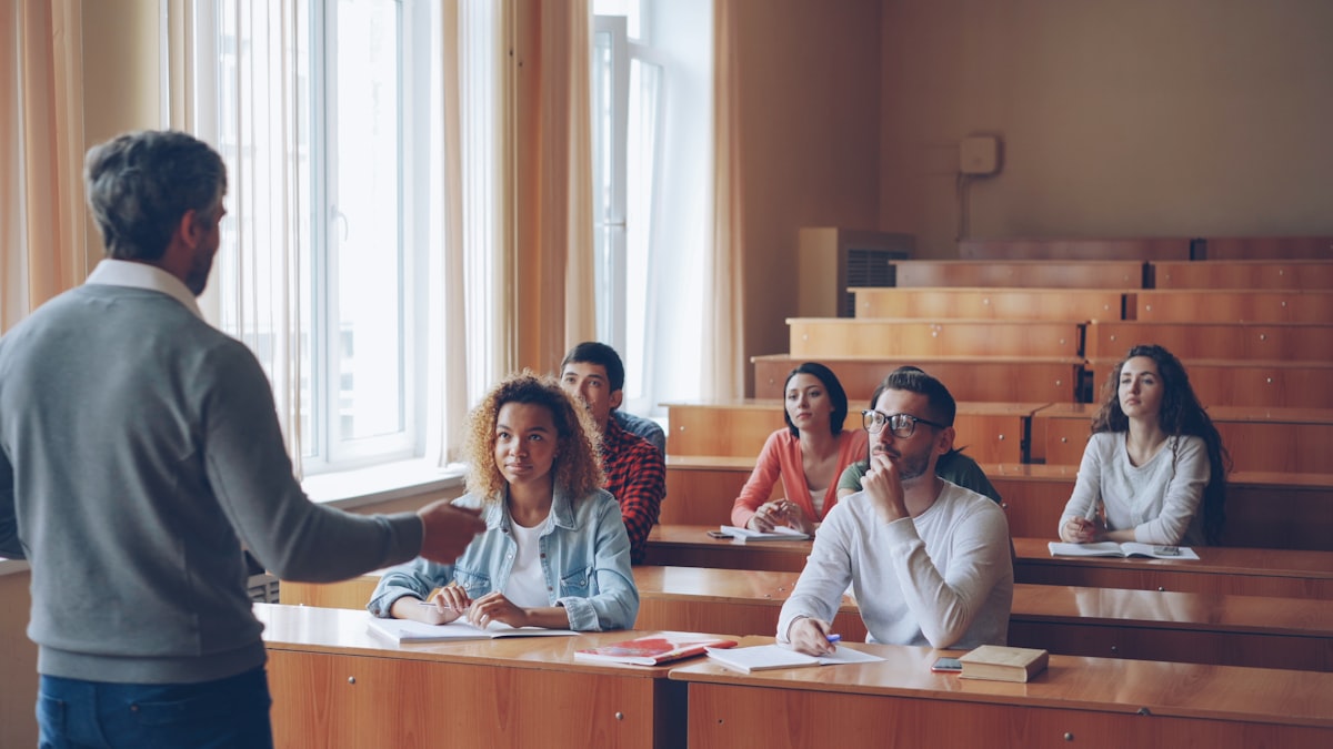 University professor lecturing to students, illustrating AI tools for college professors in 2026