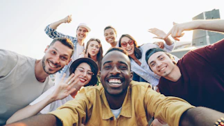 Happy Caribbean community taking a selfie