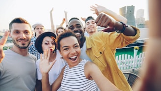 Diverse group of friends taking a selfie outdoors selfie