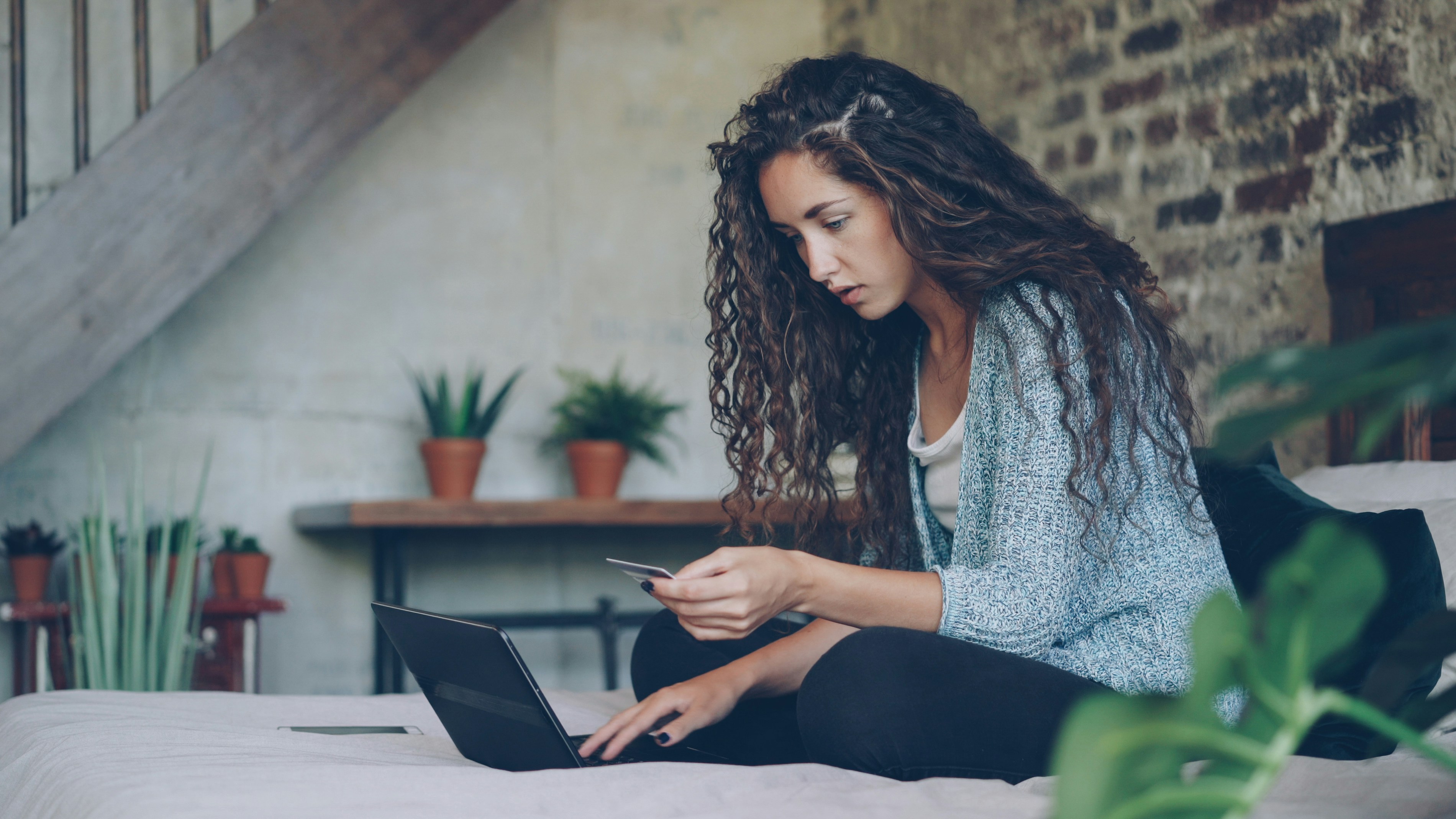 Young woman making payment