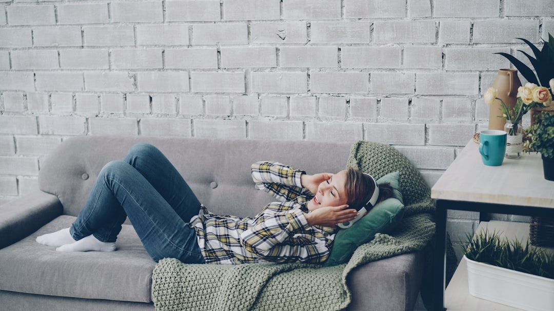 Patient comfortably relaxing at home after a non-surgical session Patient comfortably relaxing at home after a non-surgical session