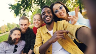 Diverse group of friends taking a selfie outdoors