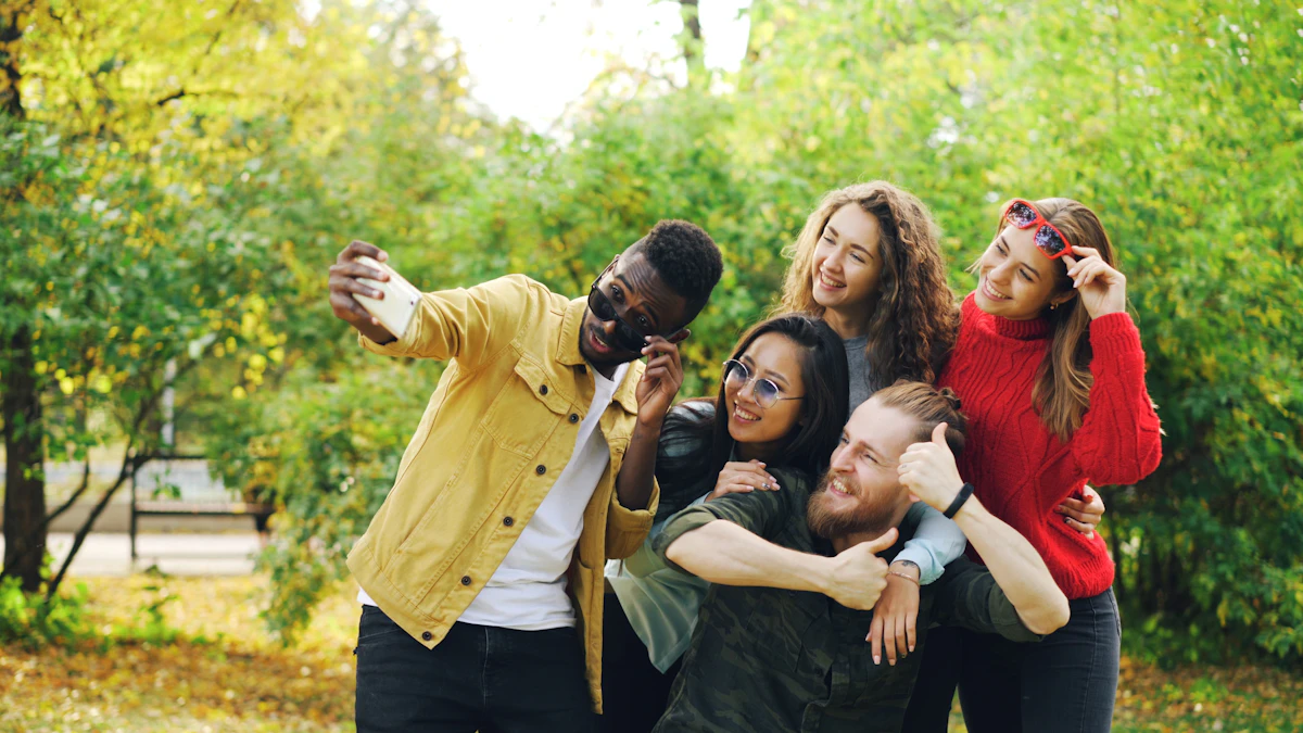 A group of friends taking a selfie together in a park