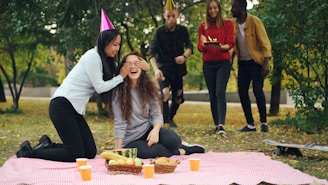 Friends surprise woman with birthday cake in park