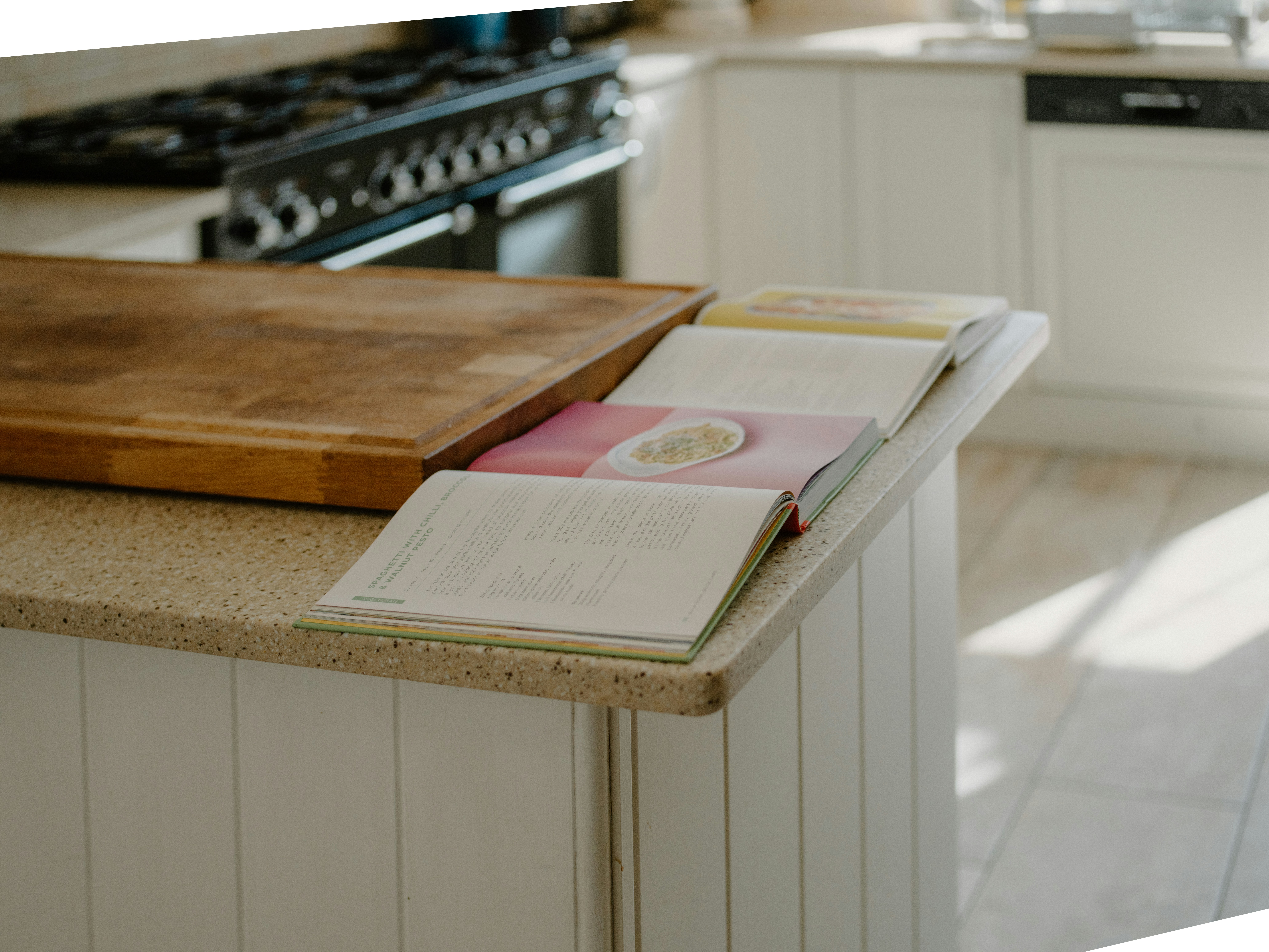 School book bag on a kitchen counter with crumpled letters and permission slips spilling out