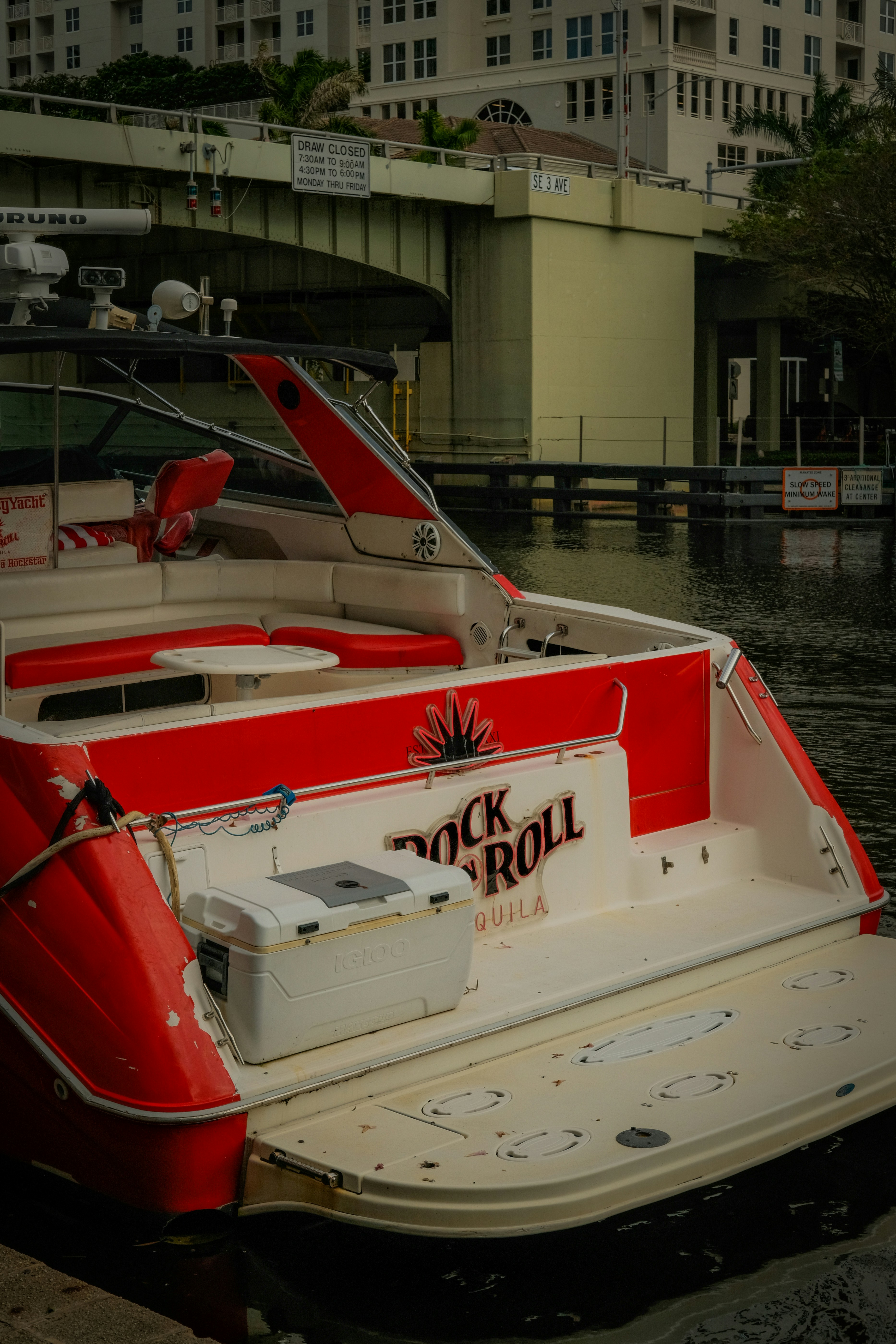 Red and white boat with "rock n roll" text.