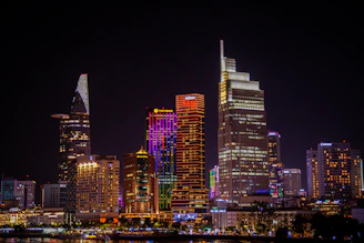 Vibrant cityscape with illuminated skyscrapers at night