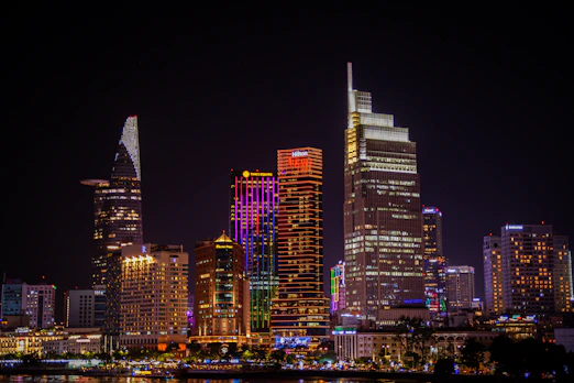 Vibrant cityscape with illuminated skyscrapers at night