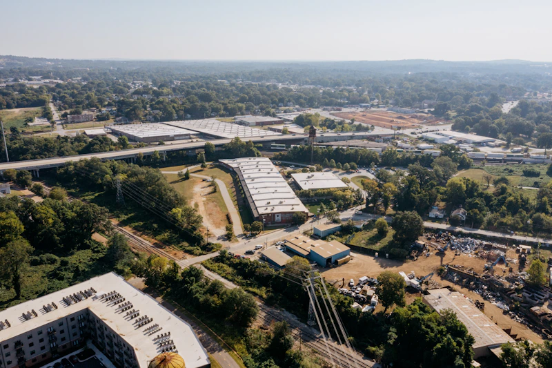 Aerial view of a distribution network hub with trucks staged at docks