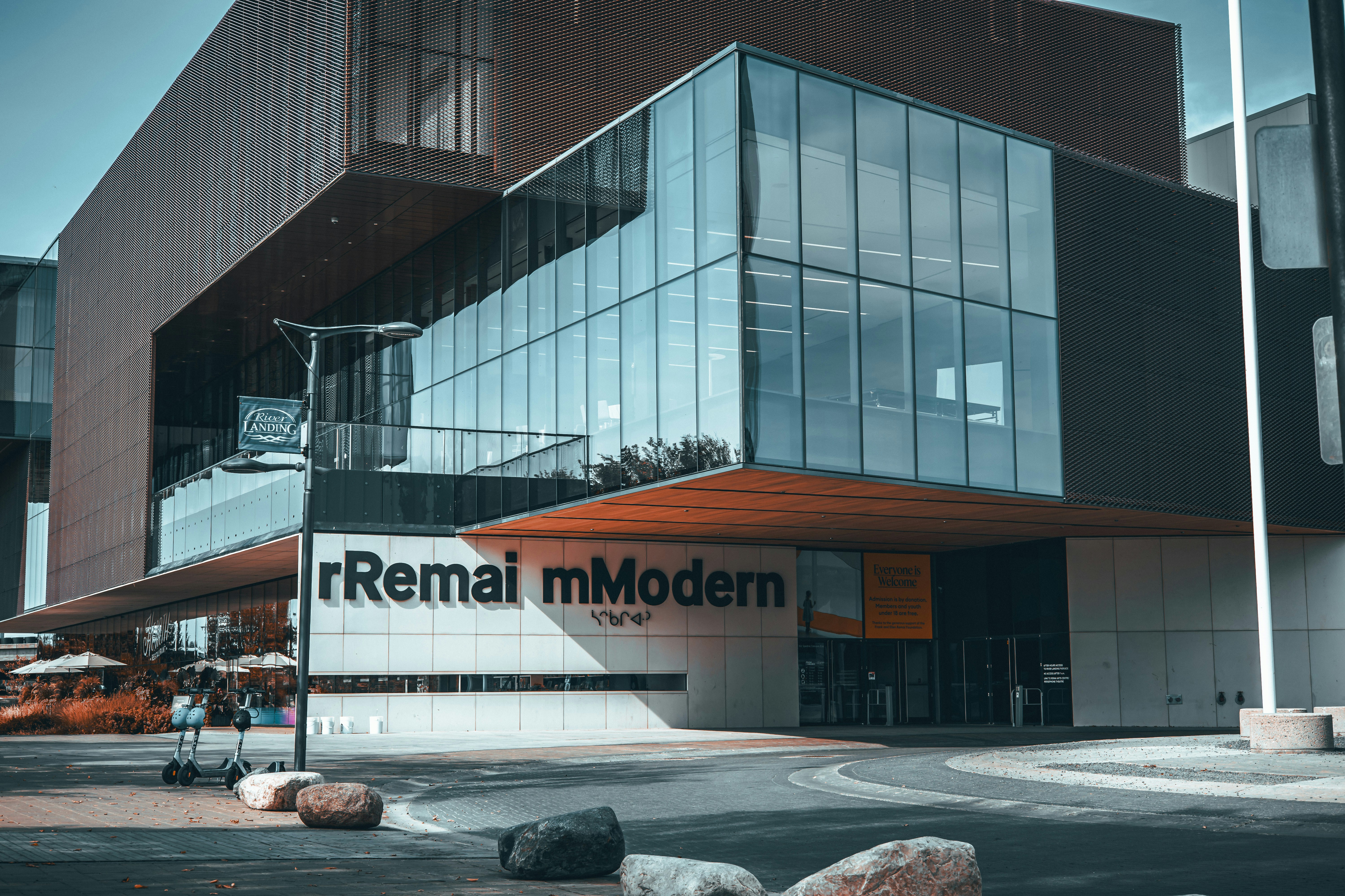 Modern architecture with glass facade and orange accents