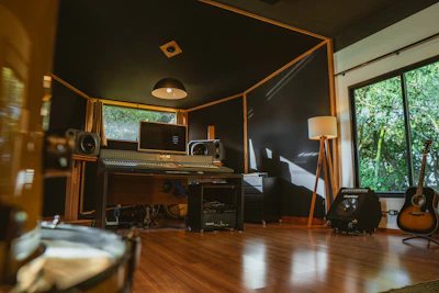 A recording studio with instruments and equipment.