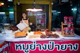 Woman selling food at a street stall
