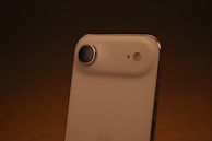 Close-up of a white smartphone camera lens