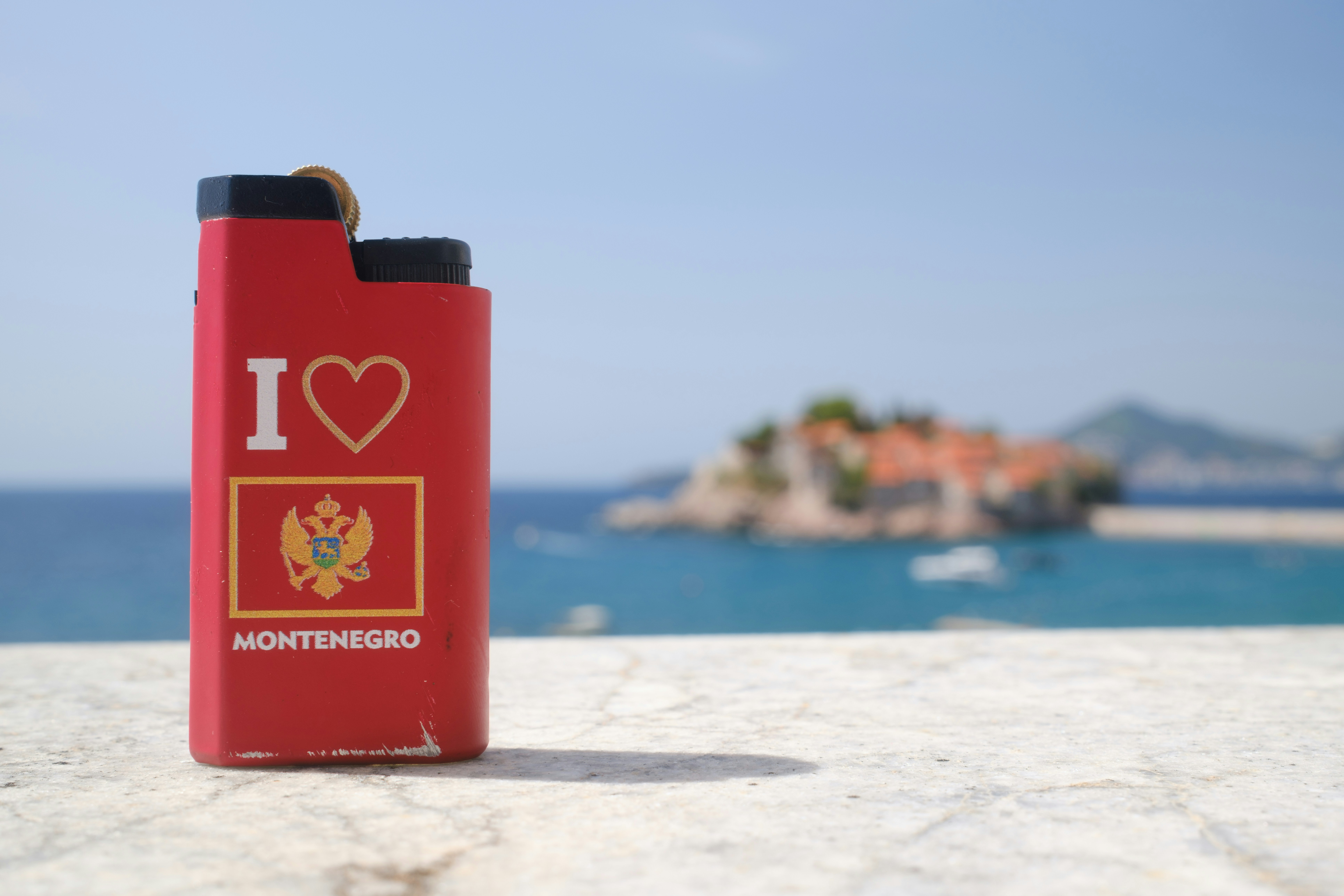Red lighter with "i love montenegro" and flag.