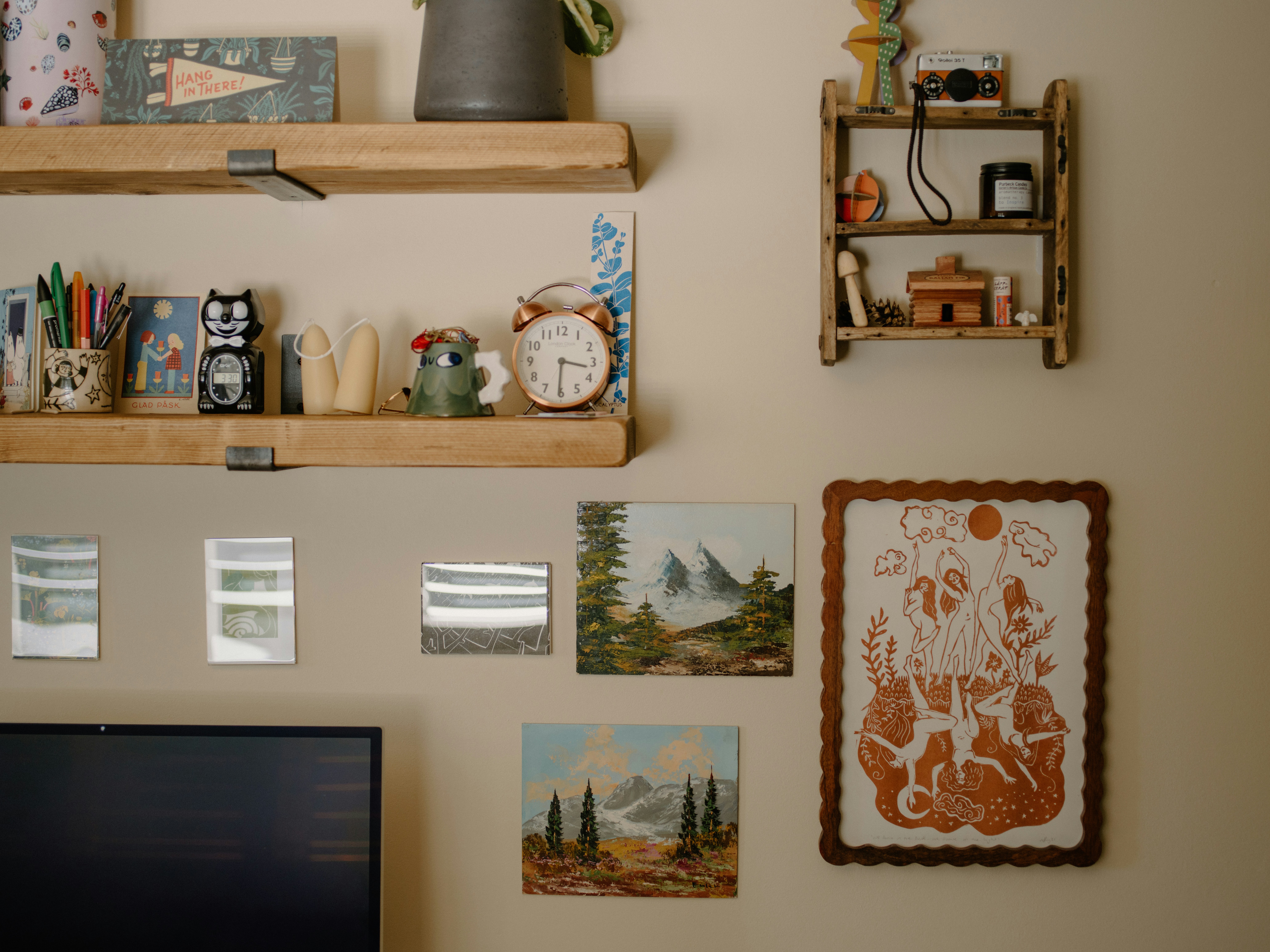 Wall with shelves and art