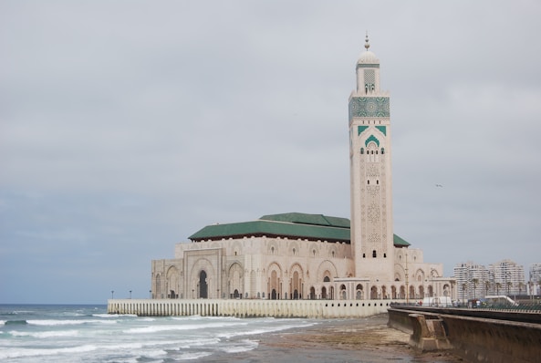Hassan ii mosque on a cloudy day by the ocean
