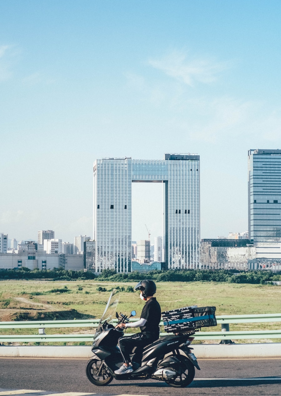 Delivery courier on scooter in modern urban setting