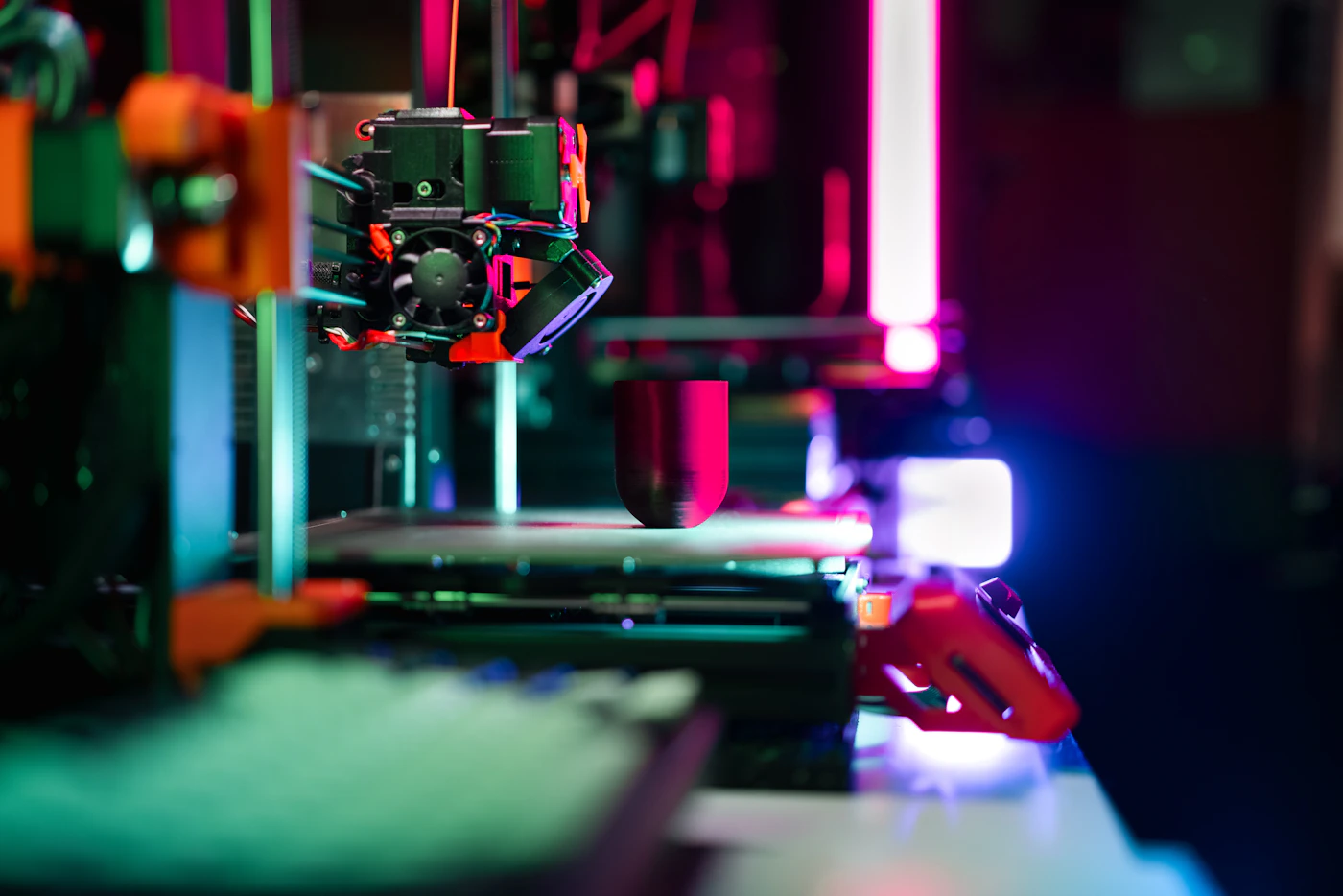 3D printer laying down a print in the lab