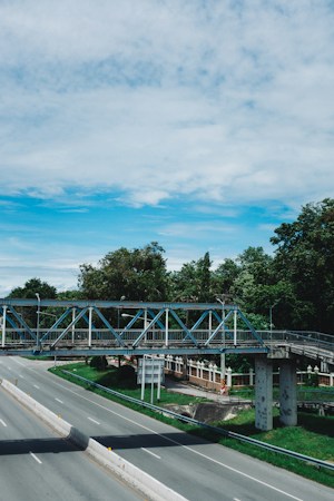 Pedestrian bridge crossing over a highway, like the three new trail bridges carrying the City of Las Vegas trail over the 215 Beltway
