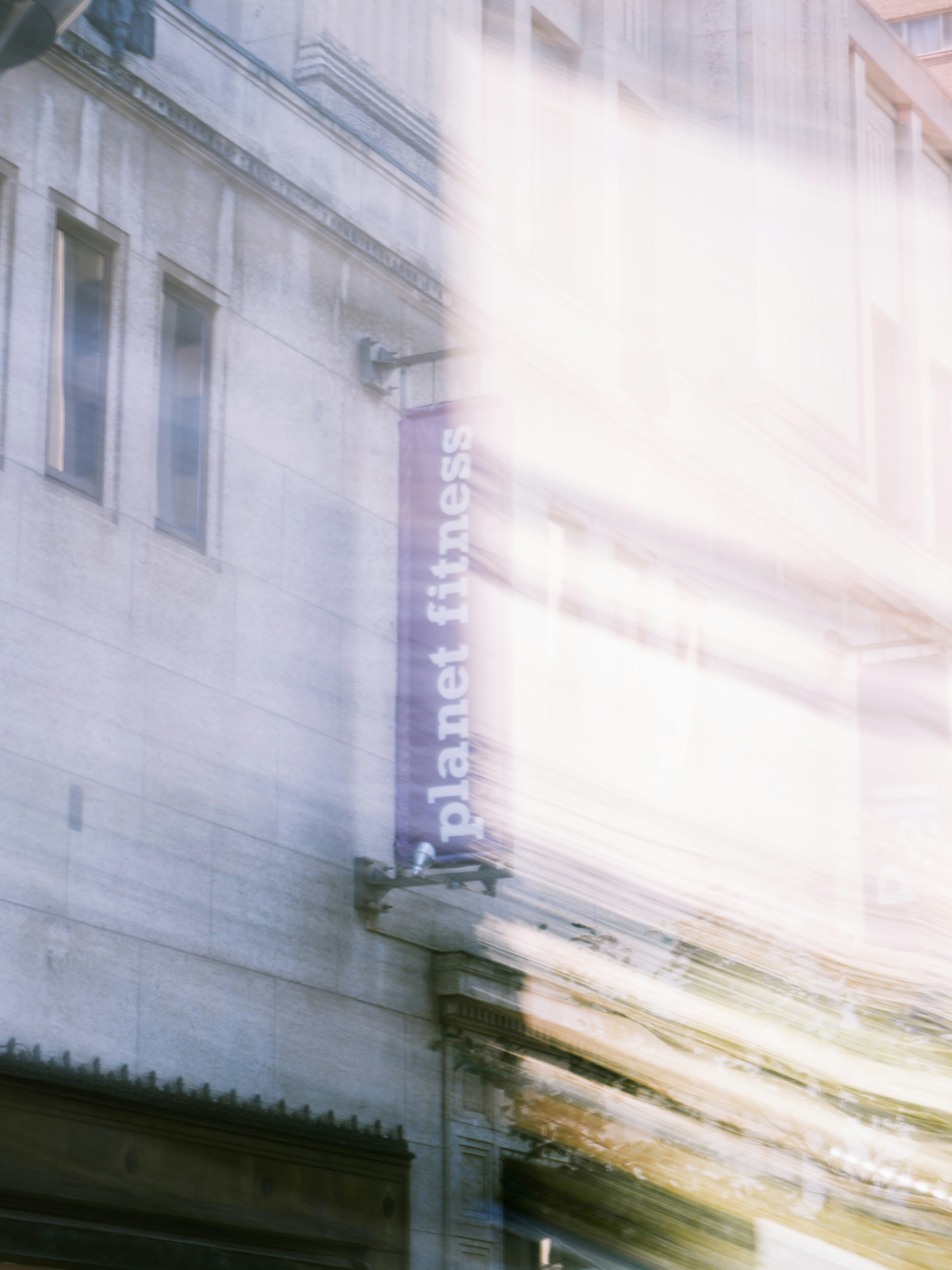 Planet fitness sign on a building exterior