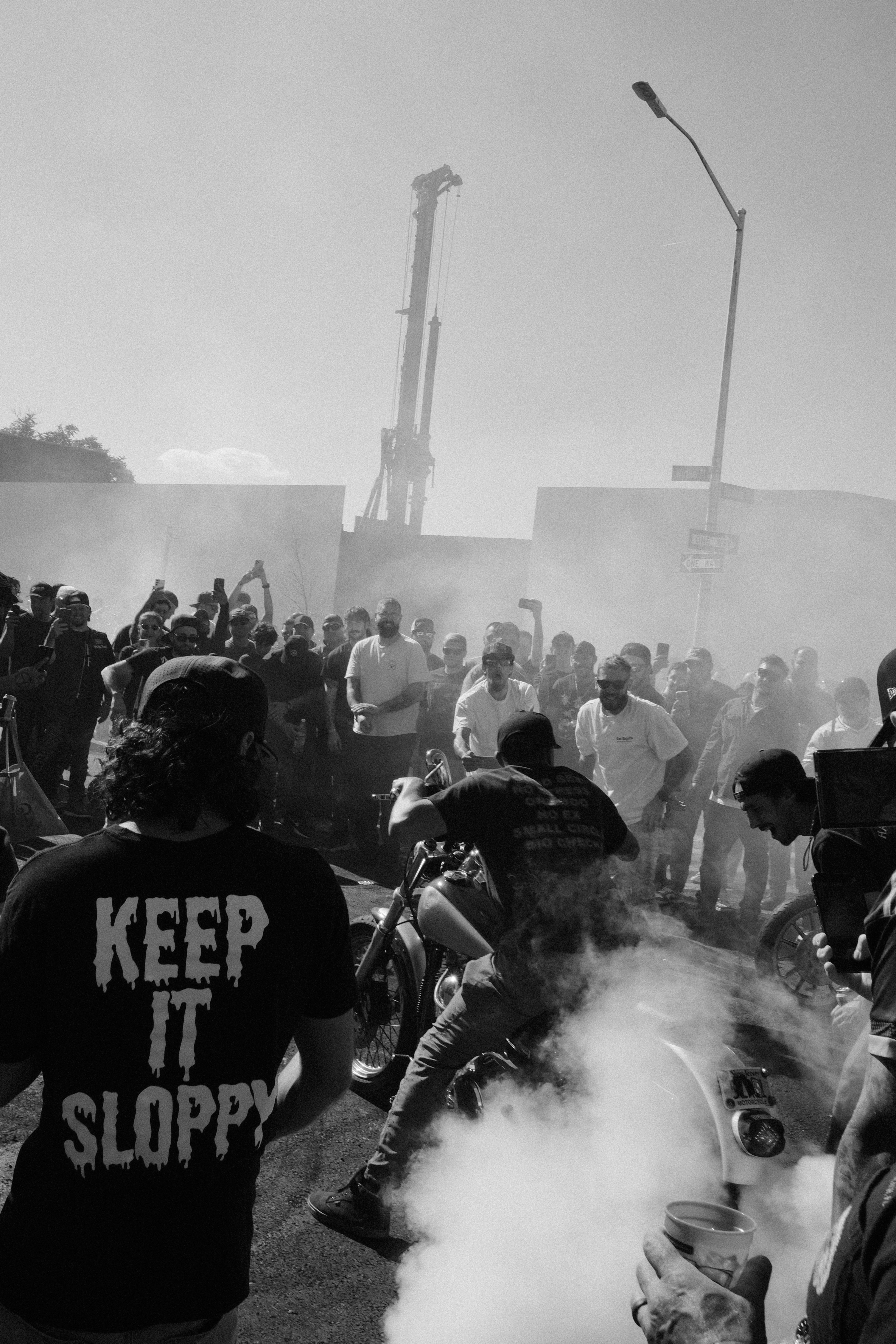 photo-1758405217695-5938bbba742e?ixid=M3wxMjA3fDB8MXxzZWFyY2h8MTJ8fG1vdG9yY3ljbGUlMjB0LXNoaXJ0c3xlbnwwfHx8fDE3NjM3ODg1MTV8MA\u0026ixlib=rb-4.1.0