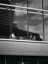 Two men in a modern office building