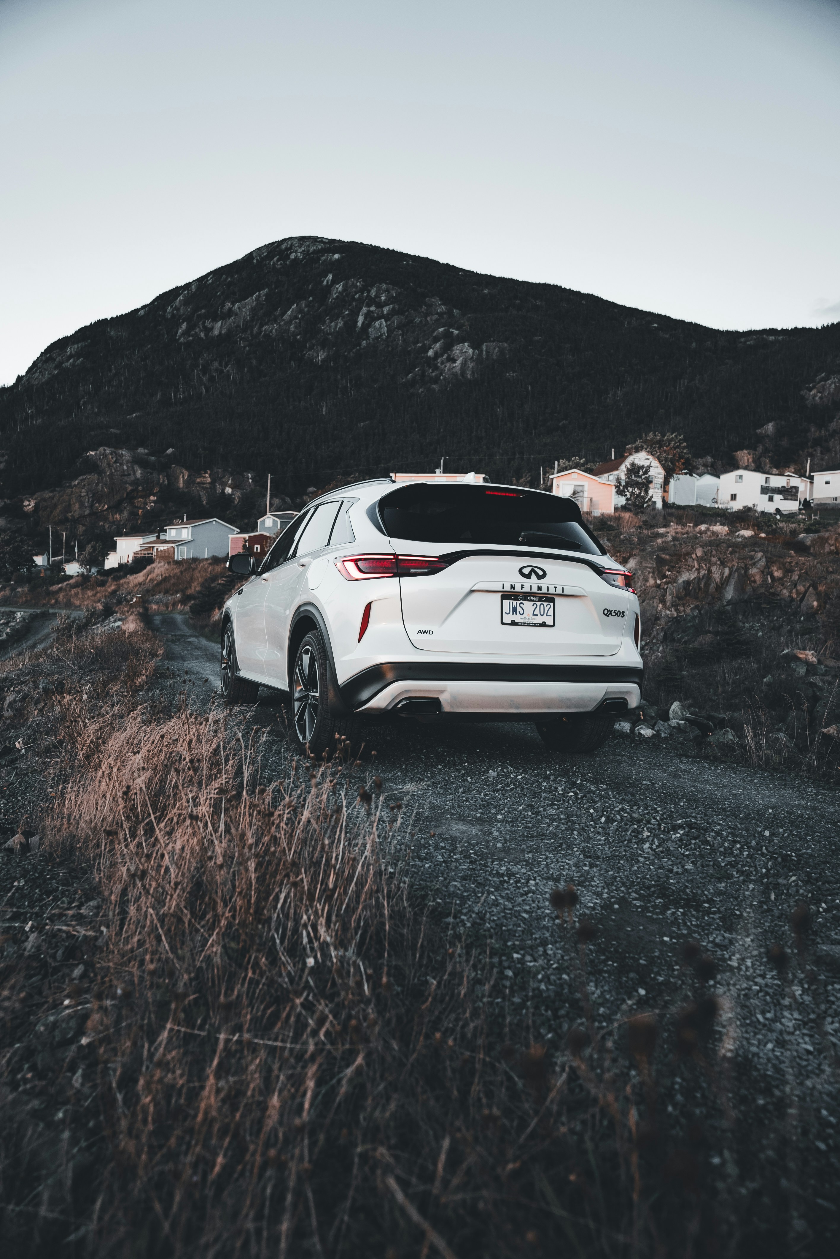 modern suv mountain road, wallpaper, 2026 Mitsubishi Crossover Reliability: Full Analysis and Outlook 4