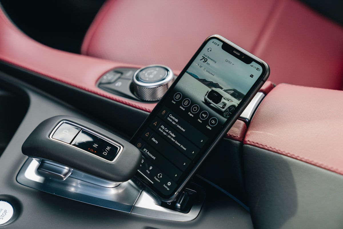 How to connect Apple CarPlay showing a smartphone linked to a car console