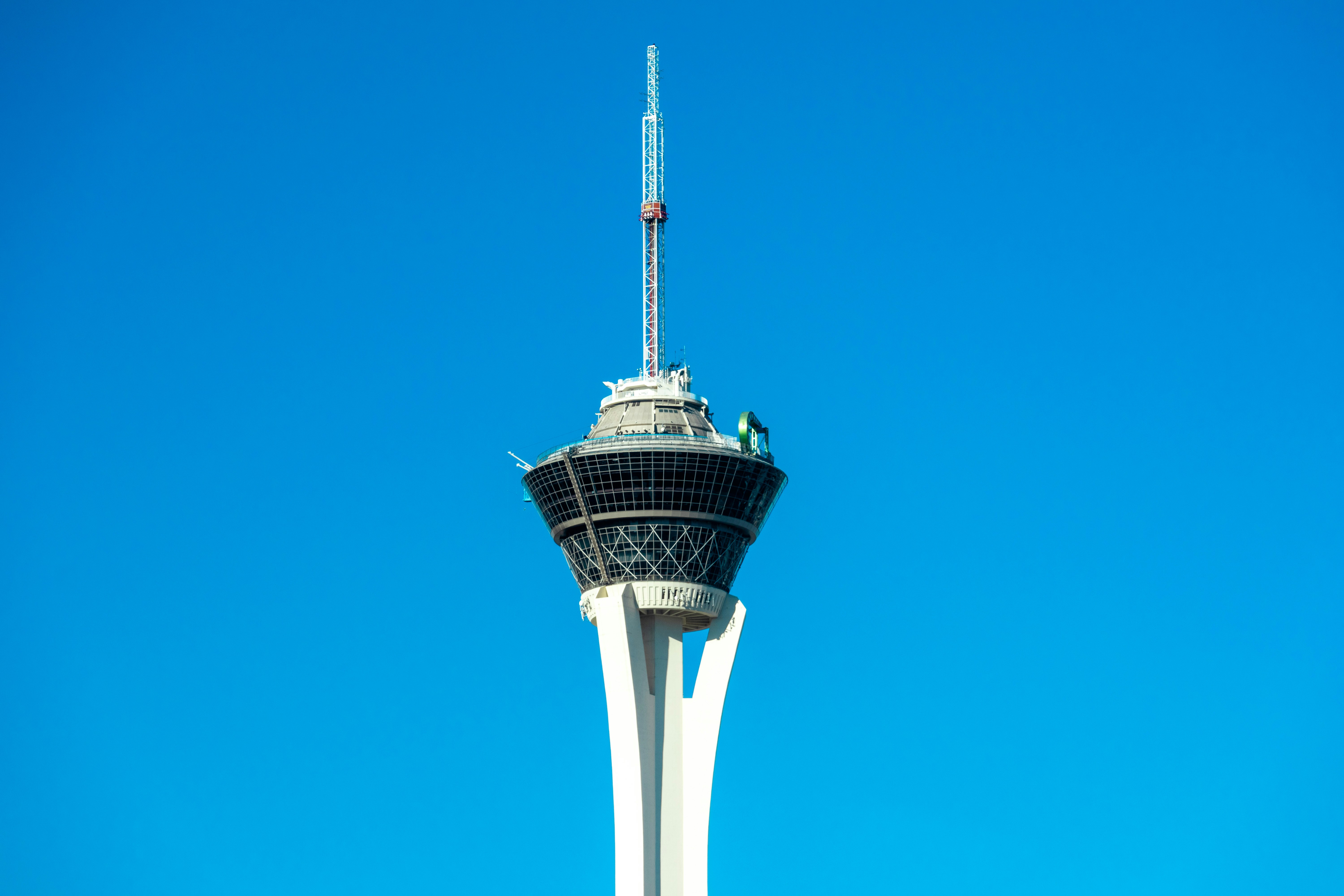 A tall tower against a clear blue sky